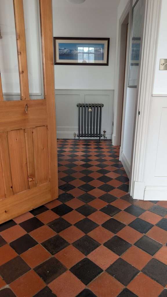 Restored Victorian quarry tile floor after cleaning and sealing with Faber P147 Plus